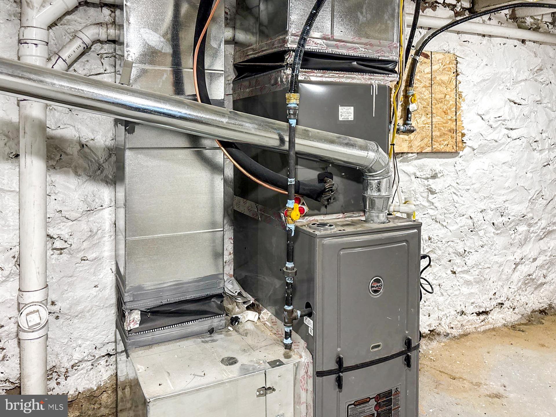 2217 Riggs Avenue Baltimore, MD 21216 - Photo 23 of 26 a bathroom with a sink and mirror