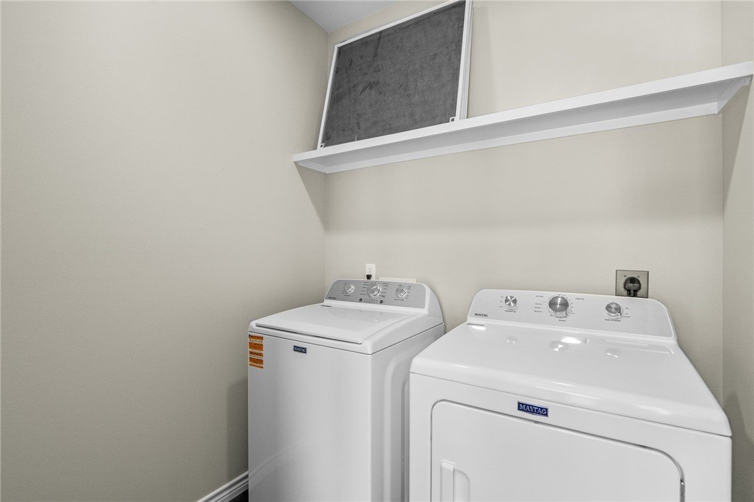 1263 East 2360th Circle Riviera, TX 78379 - Photo 13 of 40 a utility room with dryer and washer