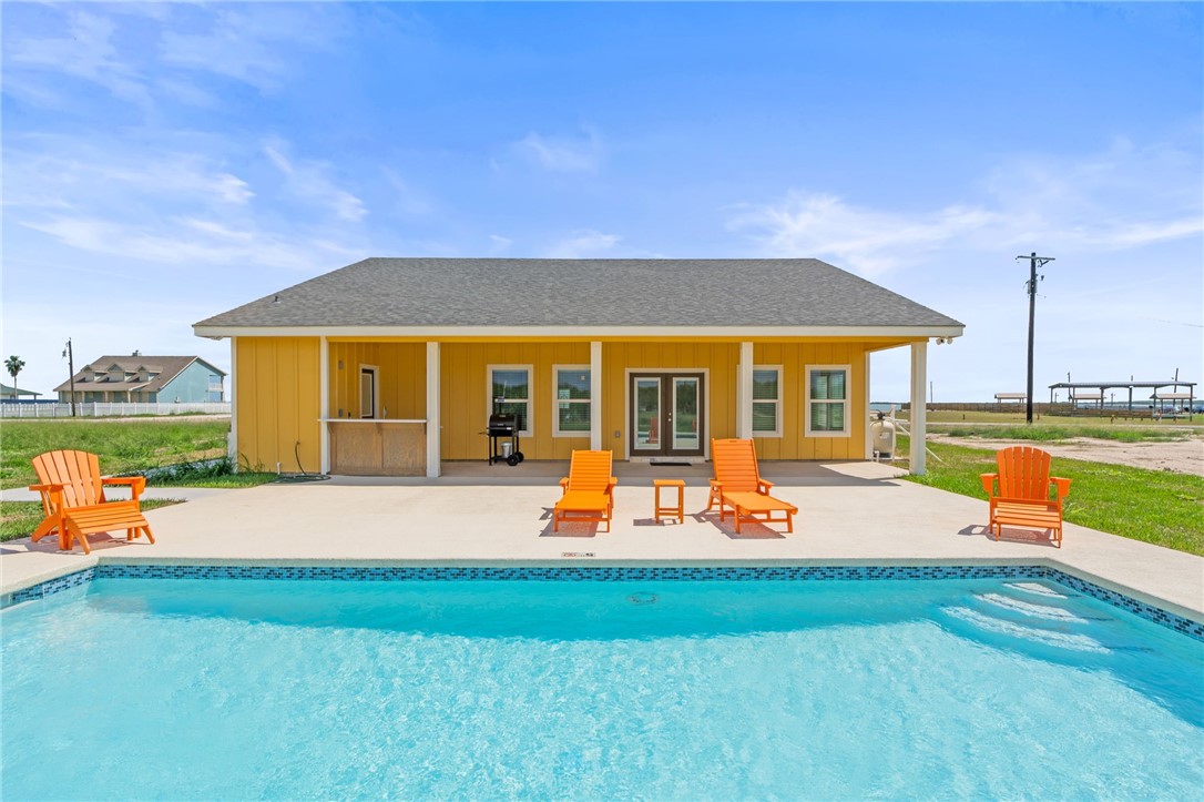 1263 East 2360th Circle Riviera, TX 78379 - Photo 14 of 40 a backyard of a house with table and chairs
