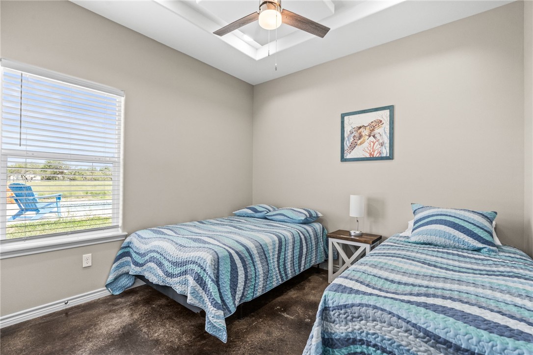1263 East 2360th Circle Riviera, TX 78379 - Photo 25 of 40 a bedroom with two beds and a window