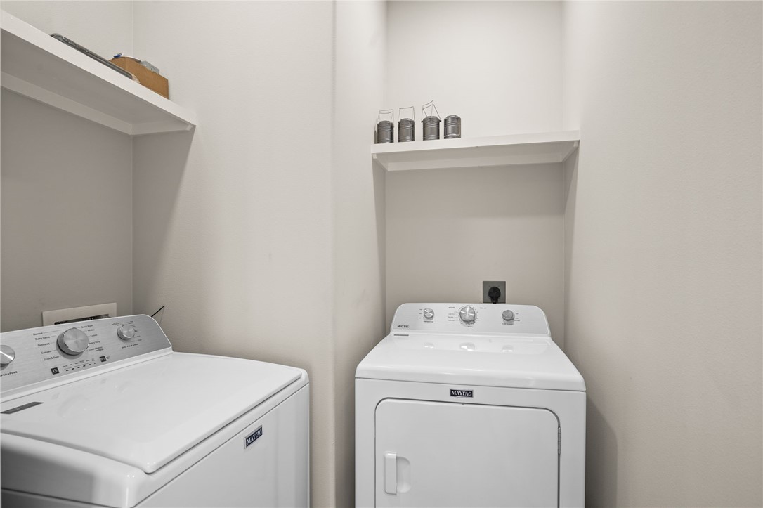 1263 East 2360th Circle Riviera, TX 78379 - Photo 31 of 40 a utility room with dryer and washer