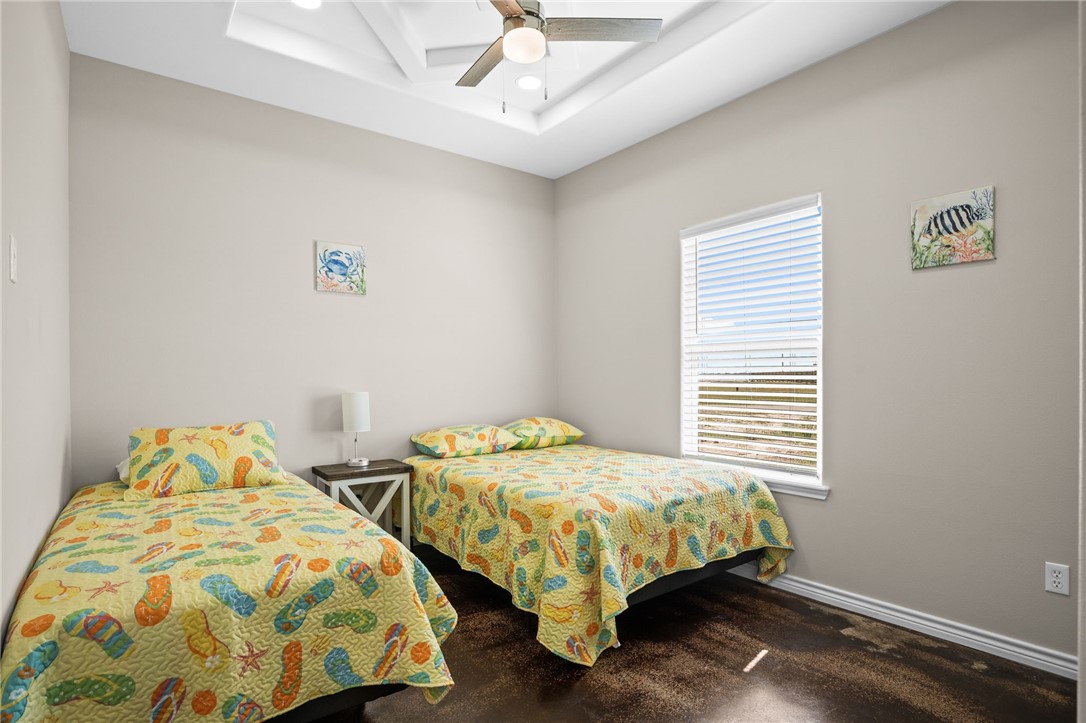 1263 East 2360th Circle Riviera, TX 78379 - Photo 34 of 40 a bedroom with two beds and a window