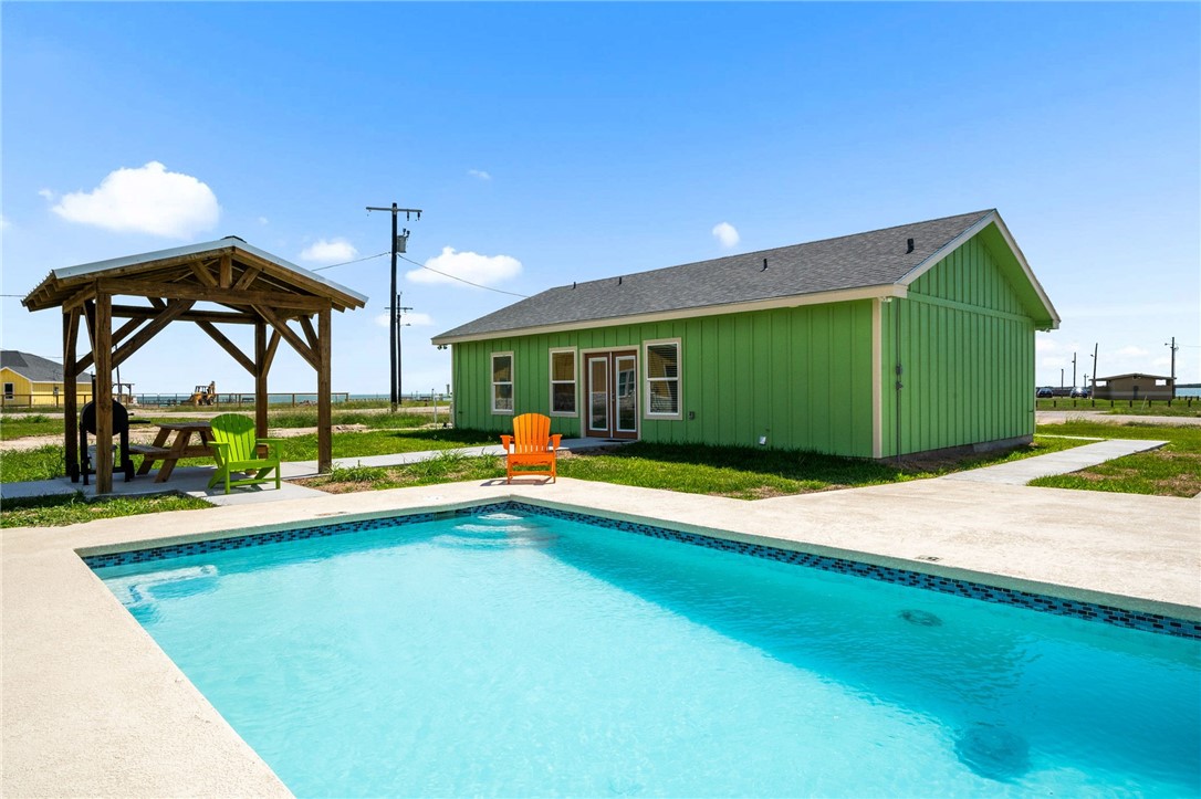 1263 East 2360th Circle Riviera, TX 78379 - Photo 37 of 40 a view of a house with a swimming pool