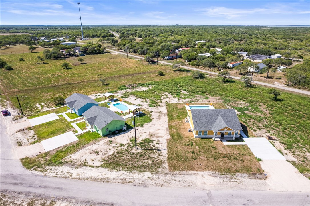 1263 East 2360th Circle Riviera, TX 78379 - Photo 40 of 40 an aerial view of residential houses with outdoor space