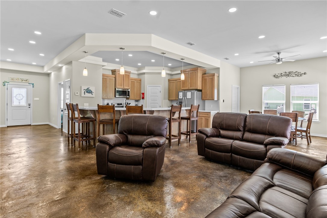 1263 East 2360th Circle Riviera, TX 78379 - Photo 4 of 40 a living room with furniture and wooden floor