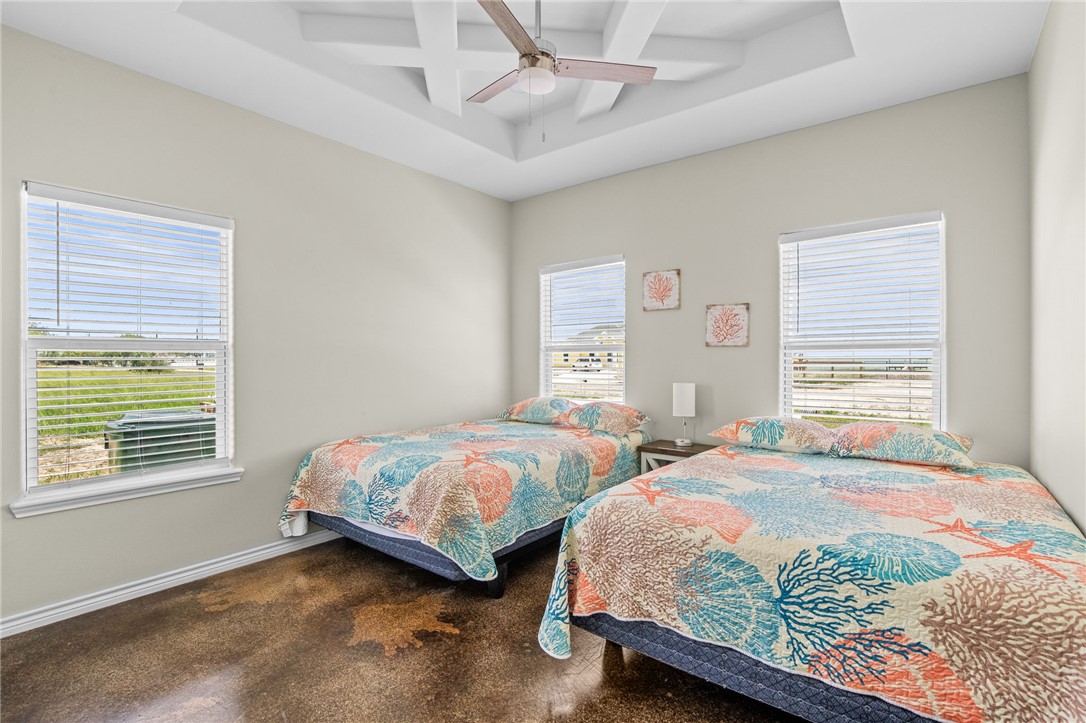 1263 East 2360th Circle Riviera, TX 78379 - Photo 10 of 40 a bedroom with two beds and a window