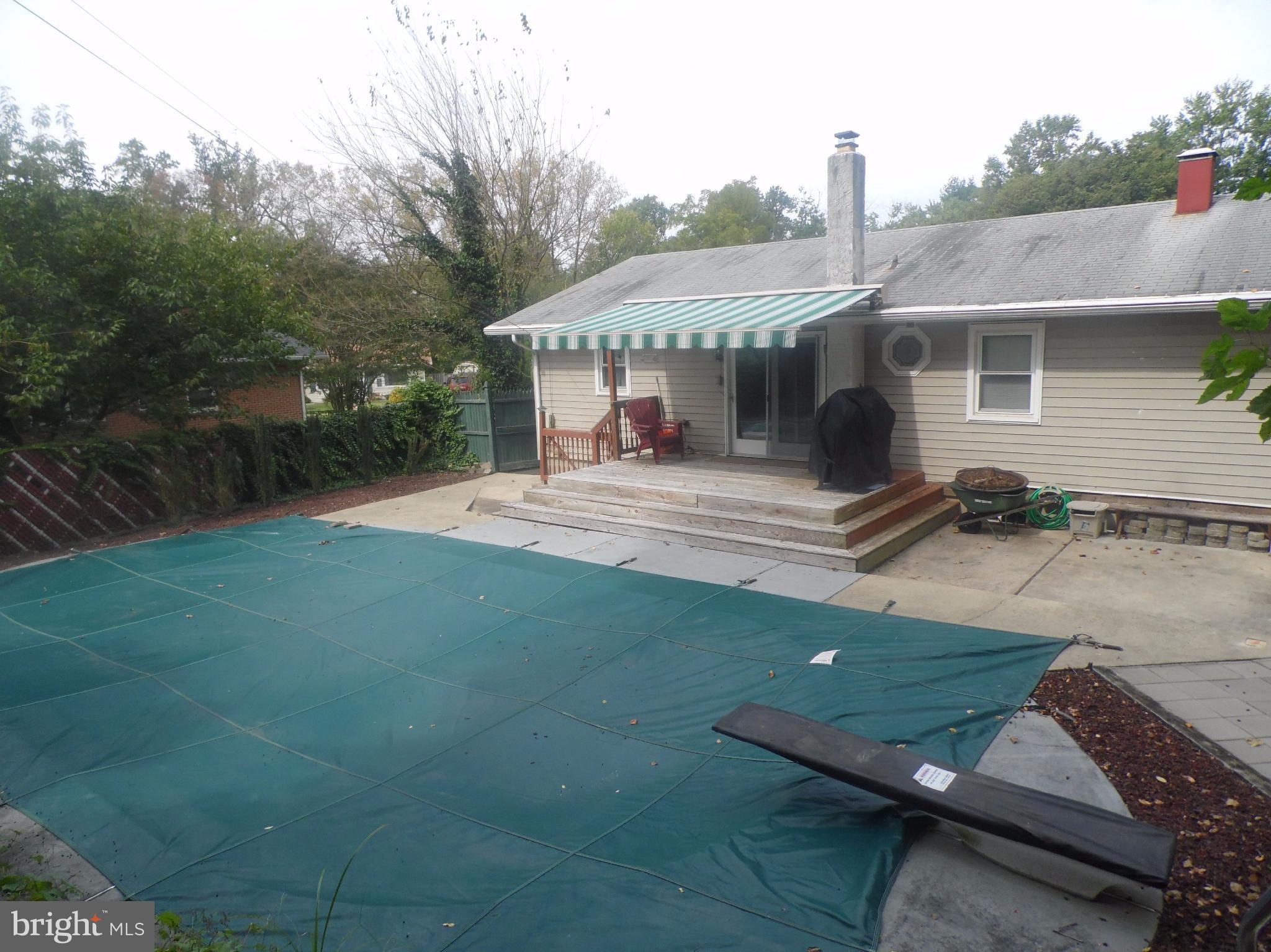 2406 Windsor Road Baltimore, MD 21234 - Photo 19 of 20 a view of a house with backyard and sitting area