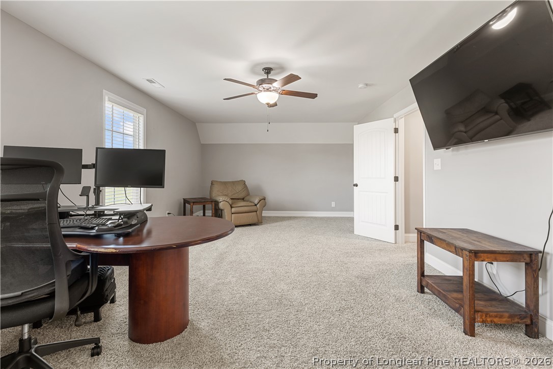 137 Minter School Road Sanford, NC 27332 - Photo 28 of 50 a view of a workspace with furniture