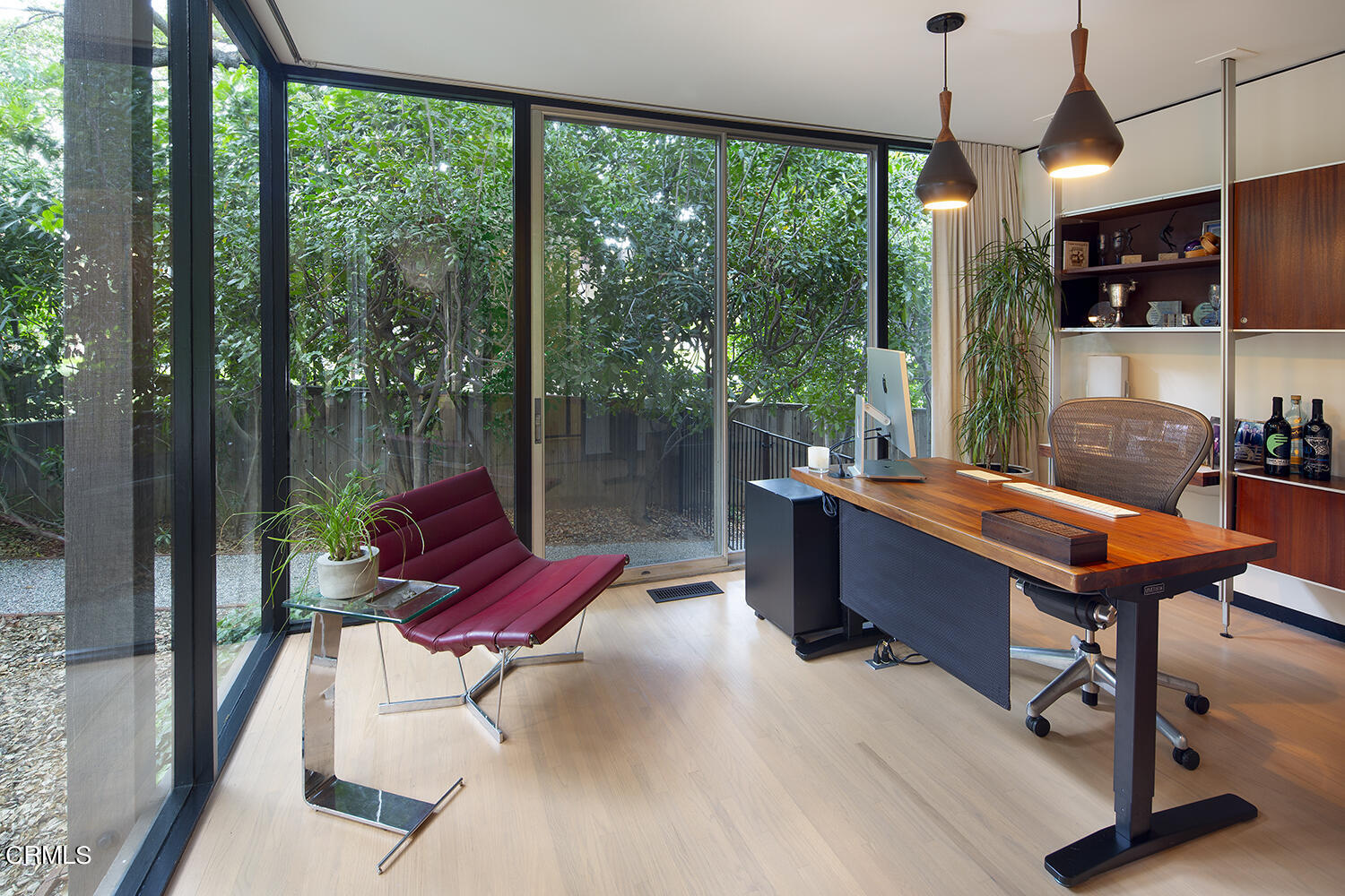 215 La Vereda Road Pasadena, CA 91105 - Photo 15 of 21 a living room with furniture a flat screen tv and a floor to ceiling window