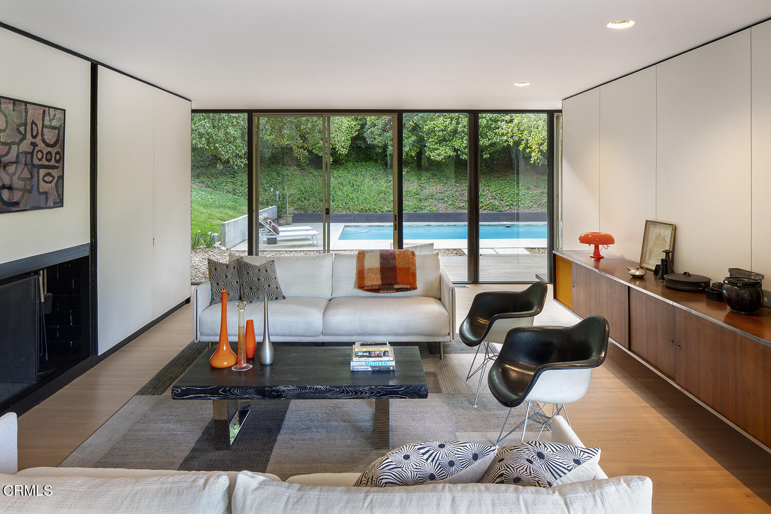 215 La Vereda Road Pasadena, CA 91105 - Photo 4 of 21 a room with large window and furniture