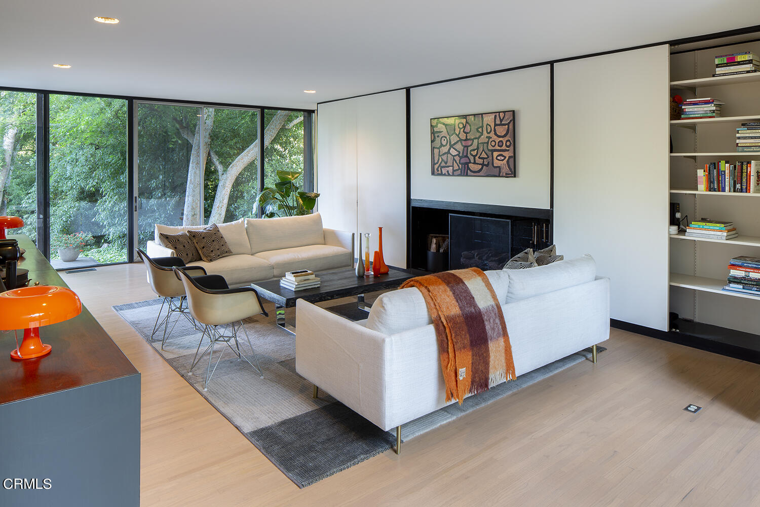 215 La Vereda Road Pasadena, CA 91105 - Photo 8 of 21 a living room with furniture and a large window