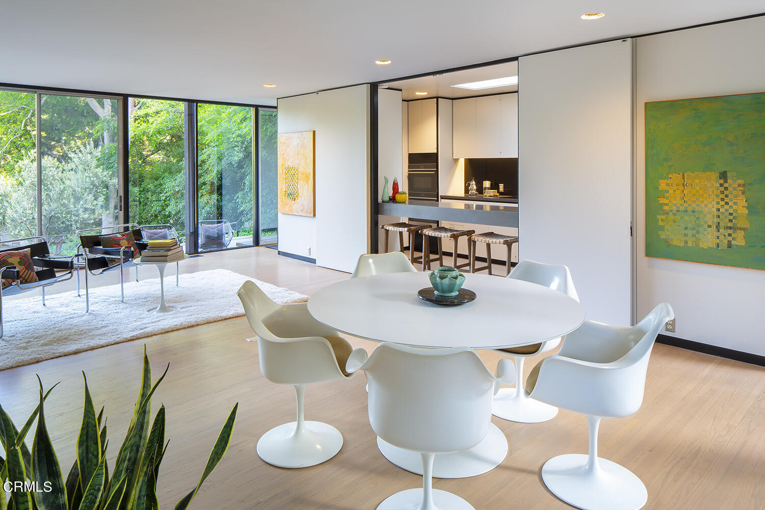 215 La Vereda Road Pasadena, CA 91105 - Photo 10 of 21 a view of a dining room with furniture window and outside view