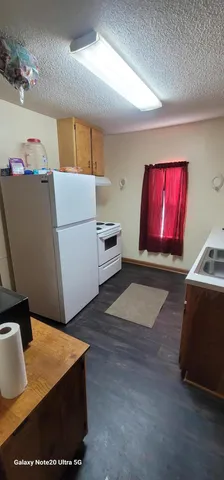 a room with furniture and a flat screen tv