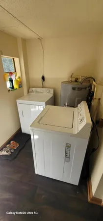 a utility room with washer and dryer