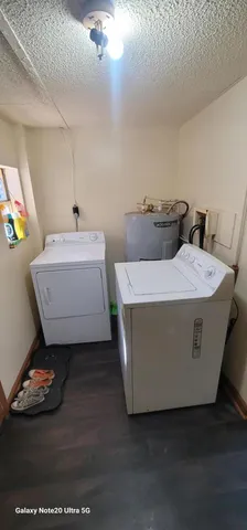 a utility room with washer and dryer