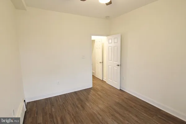a bathroom with a sink and vanity