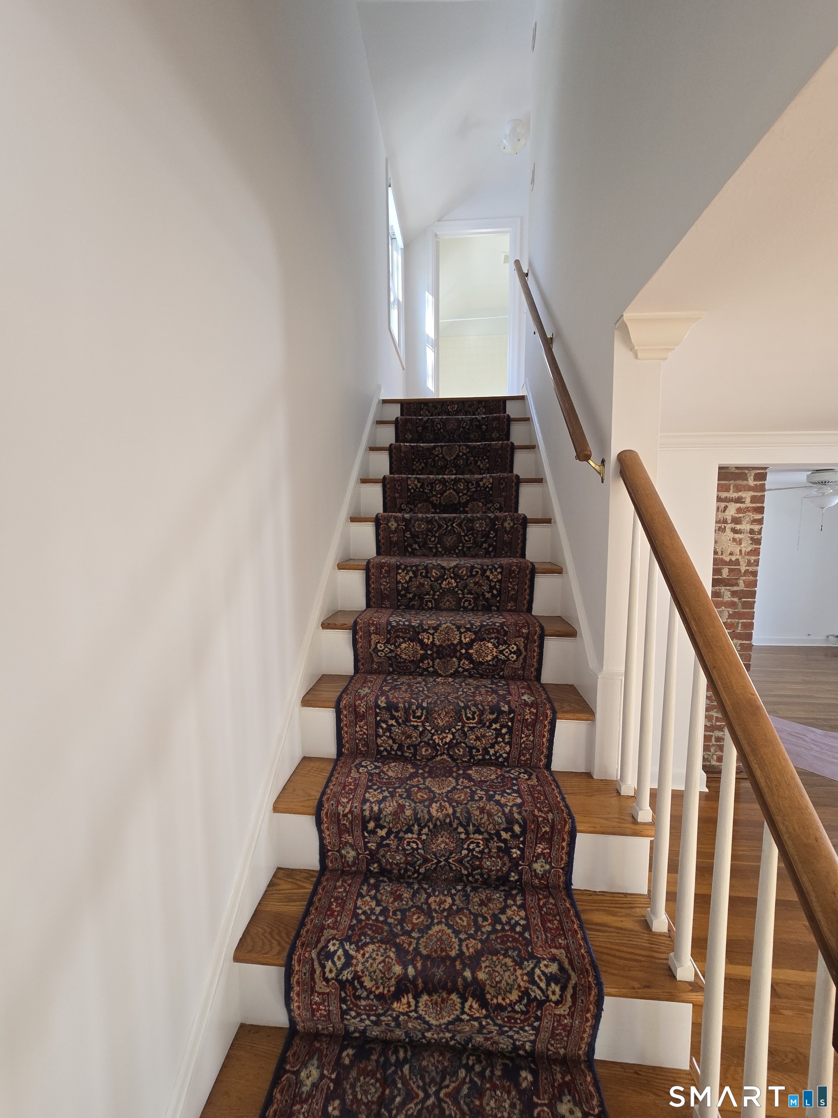 148 Catherine Street Fairfield, CT 06824 - Photo 20 of 25 a view of entryway with stairs