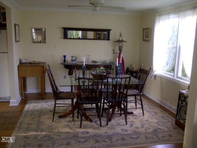 148 Catherine Street Fairfield, CT 06824 - Photo 5 of 25 a view of a dining room with furniture and a window