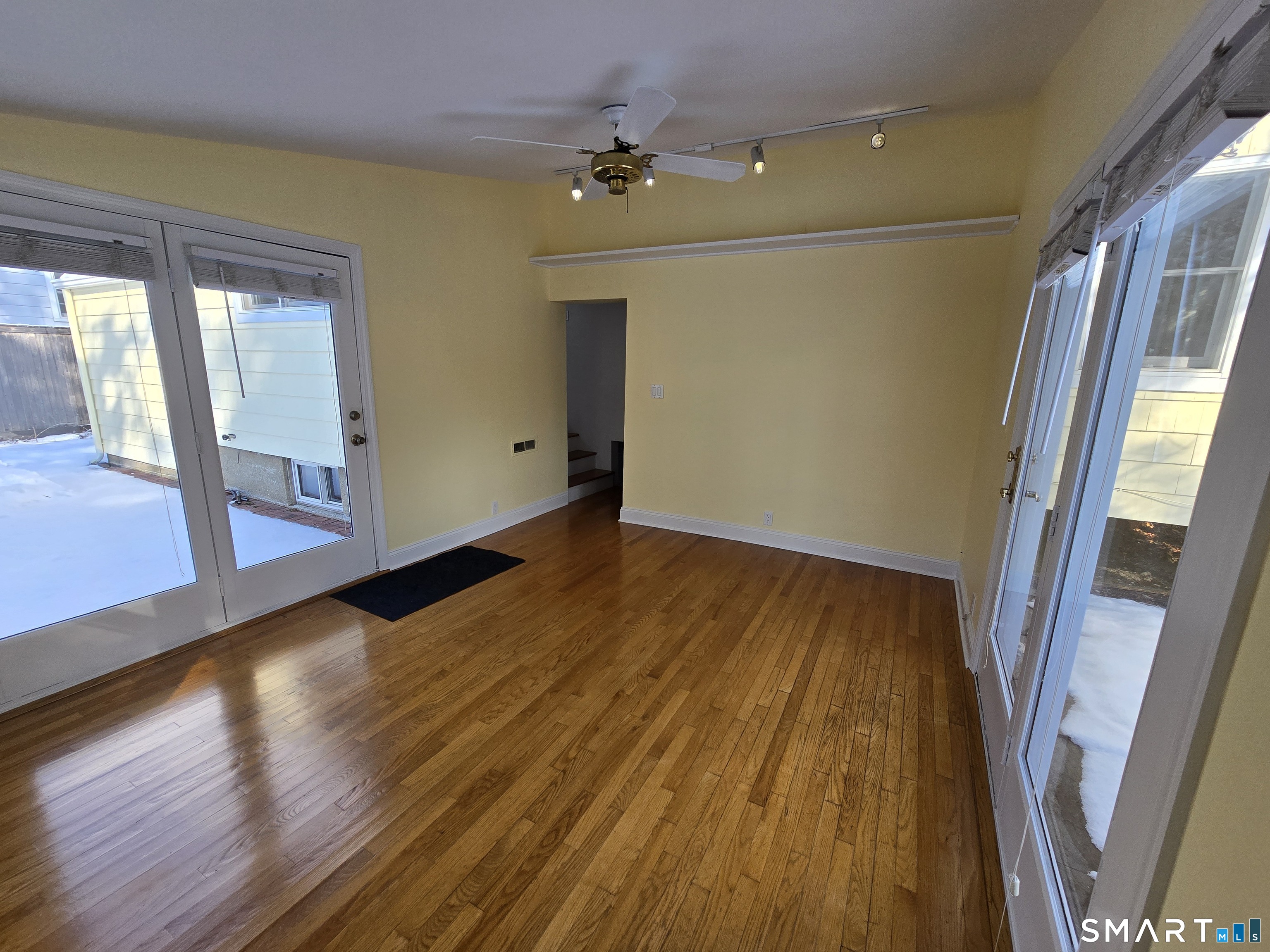 148 Catherine Street Fairfield, CT 06824 - Photo 9 of 25 a view of an entryway with wooden floor