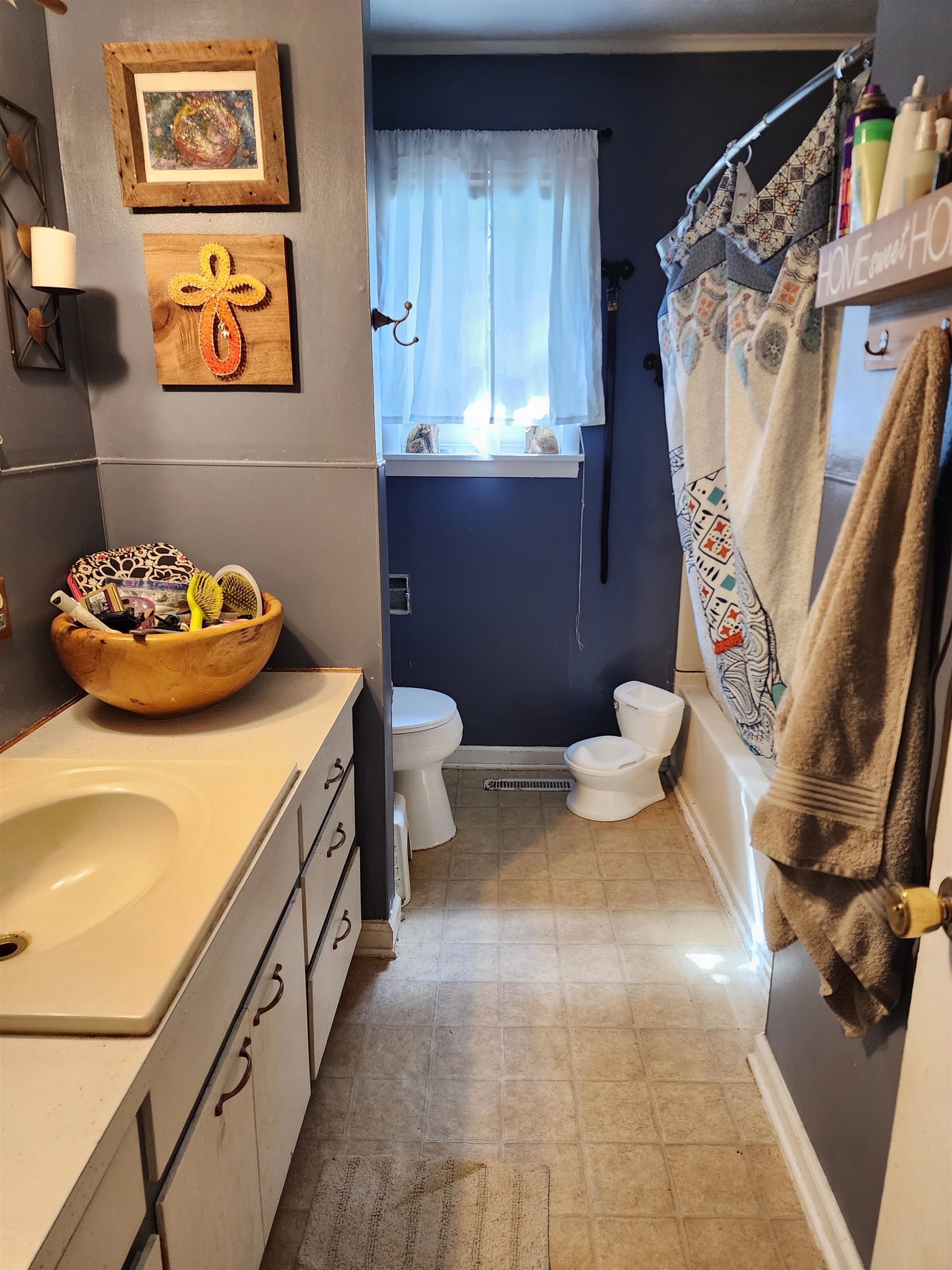 1607 Curve Nankipoo Road Ripley, TN 38063 - Photo 6 of 8 a bathroom with a toilet and a sink