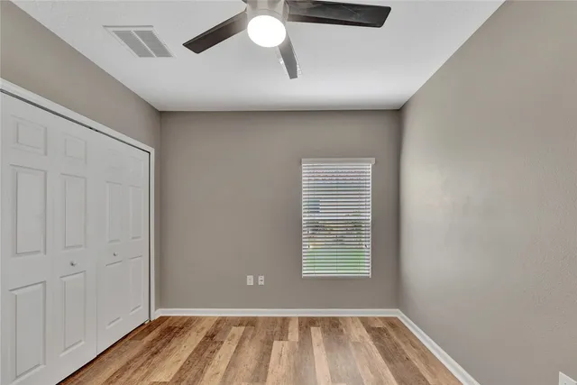a view of a livingroom with wooden floor