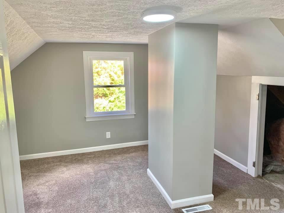 71 Gentry Dunkley Road Roxboro, NC 27574 - Photo 11 of 14 a view of an empty room with a window