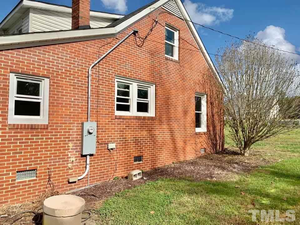 71 Gentry Dunkley Road Roxboro, NC 27574 - Photo 14 of 14 a front view of a house with a yard