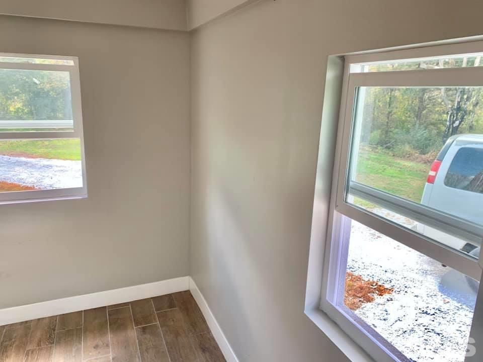 71 Gentry Dunkley Road Roxboro, NC 27574 - Photo 6 of 14 a view of small space with wooden floor and front door