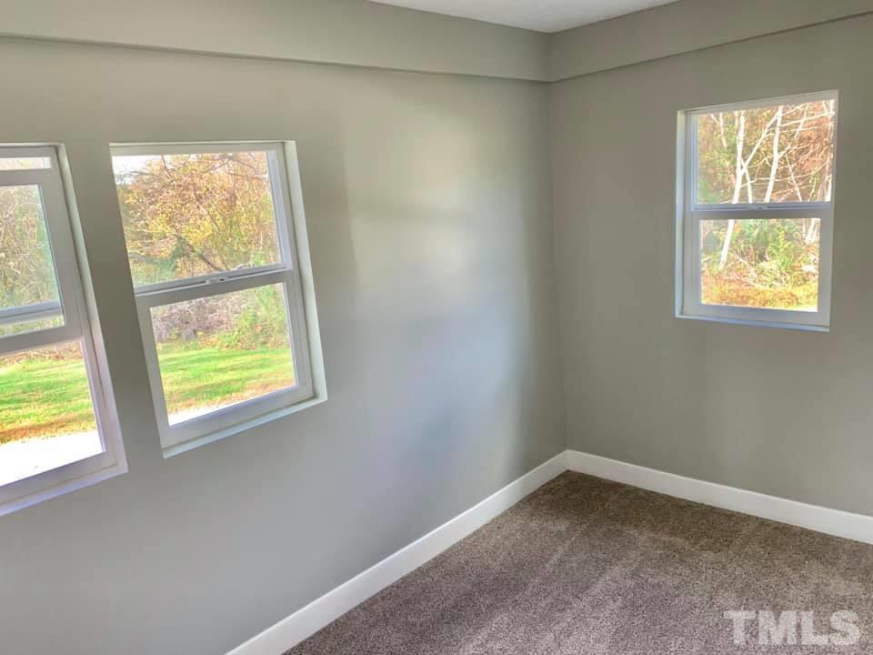 71 Gentry Dunkley Road Roxboro, NC 27574 - Photo 9 of 14 an empty room with a window
