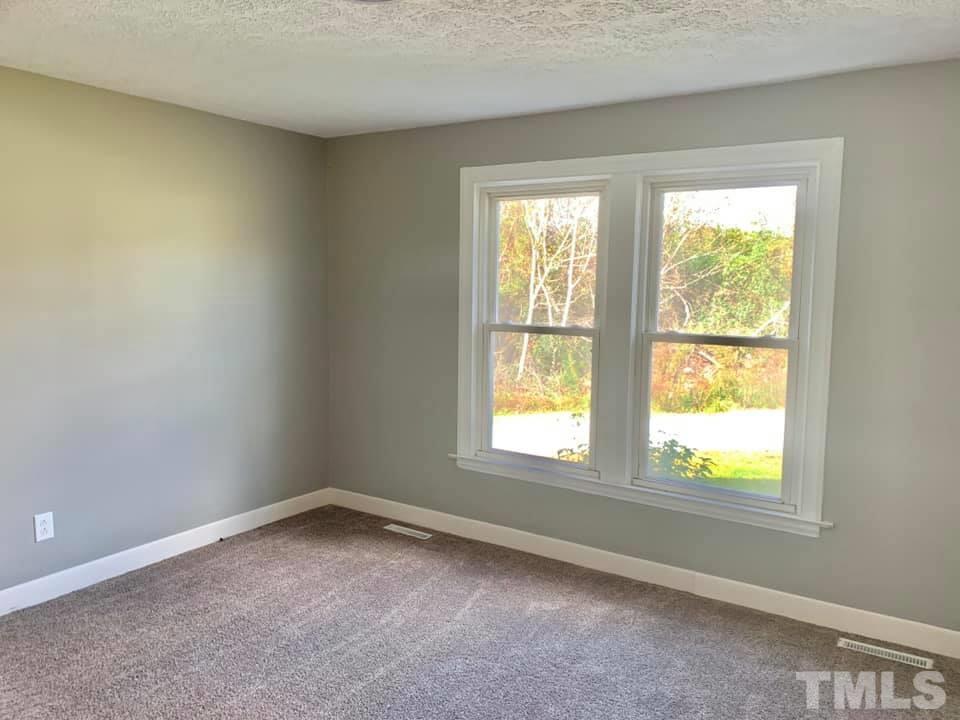 71 Gentry Dunkley Road Roxboro, NC 27574 - Photo 10 of 14 an empty room with a window