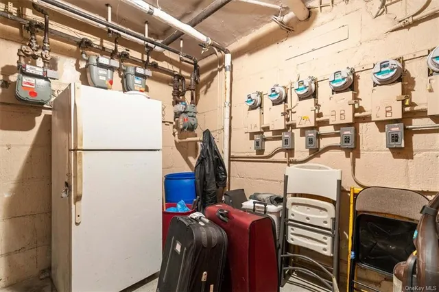 a view of storage and utility room with washer and dryer