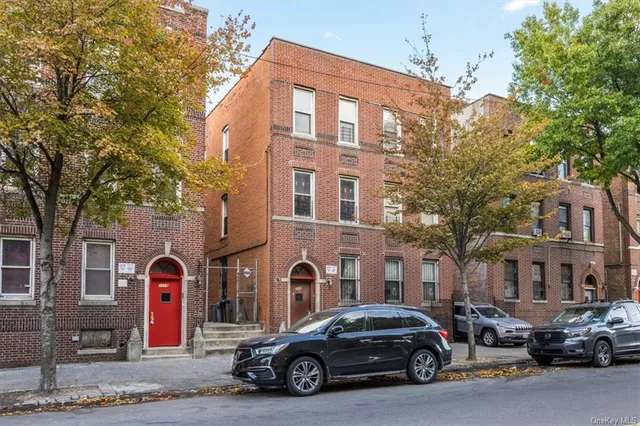 a car parked in front of a building