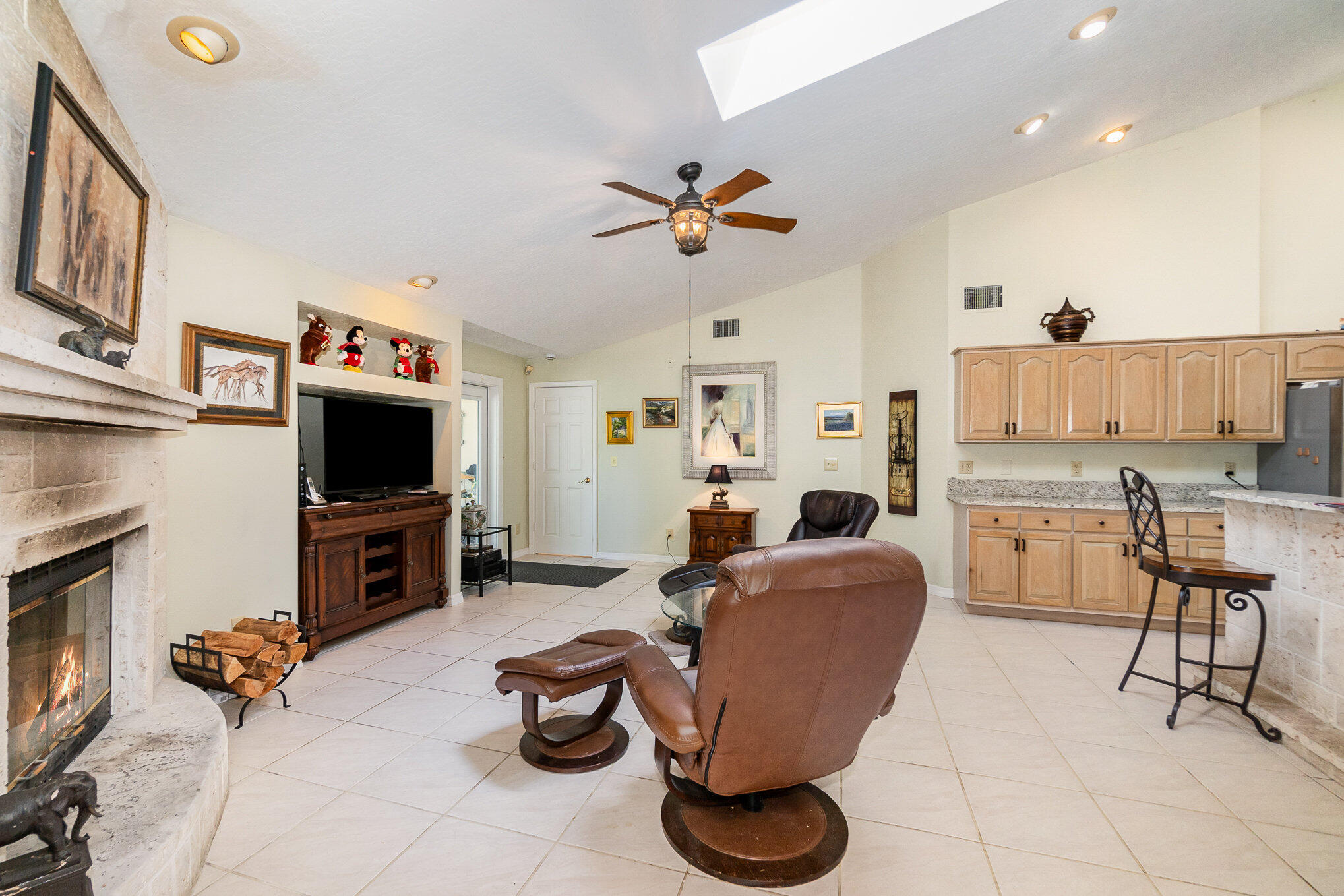234 Deer Run Road Palm Bay, FL 32909 - Photo 14 of 50 a living room with furniture and a flat screen tv