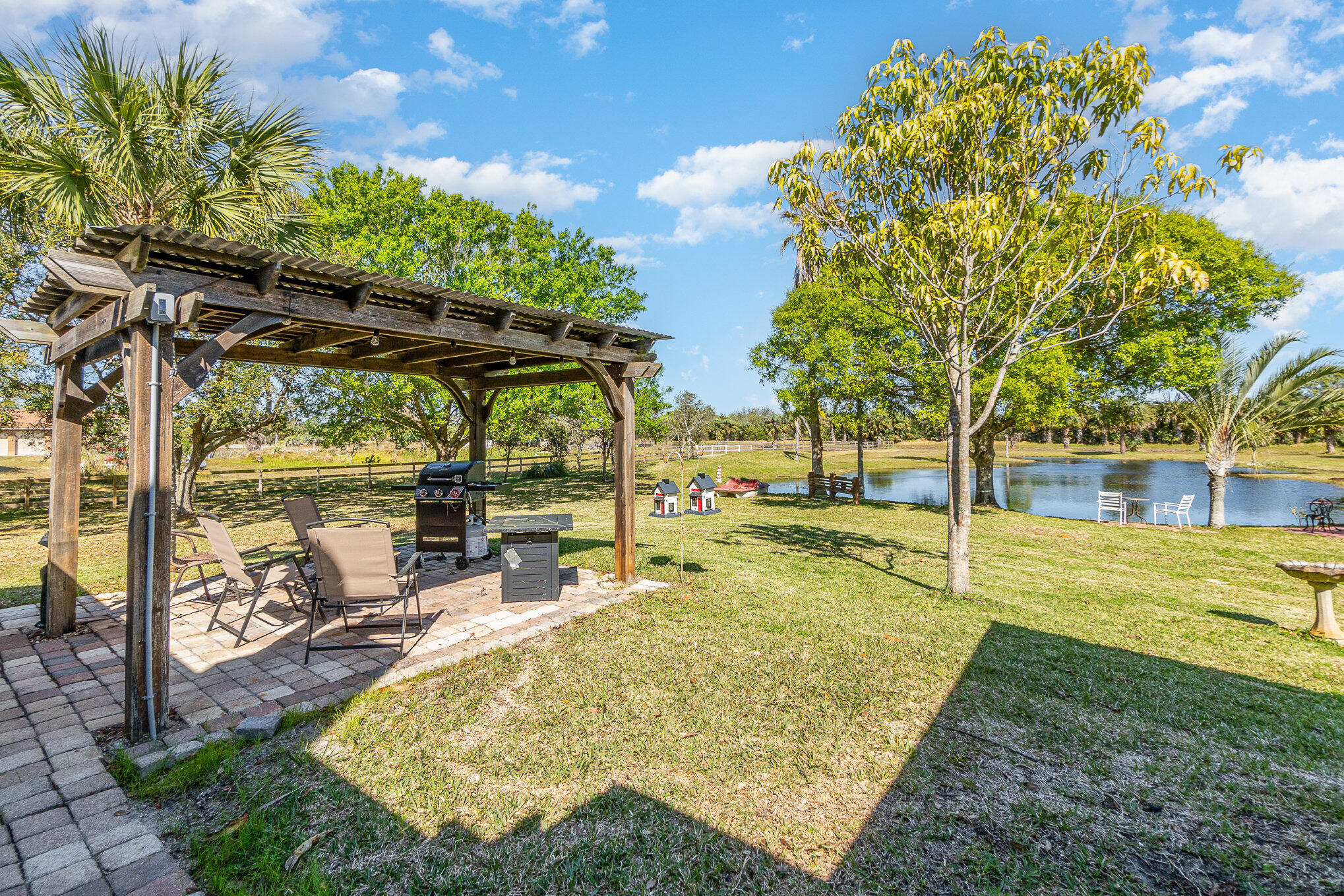 234 Deer Run Road Palm Bay, FL 32909 - Photo 28 of 50 a view of a swimming pool with an outdoor seating