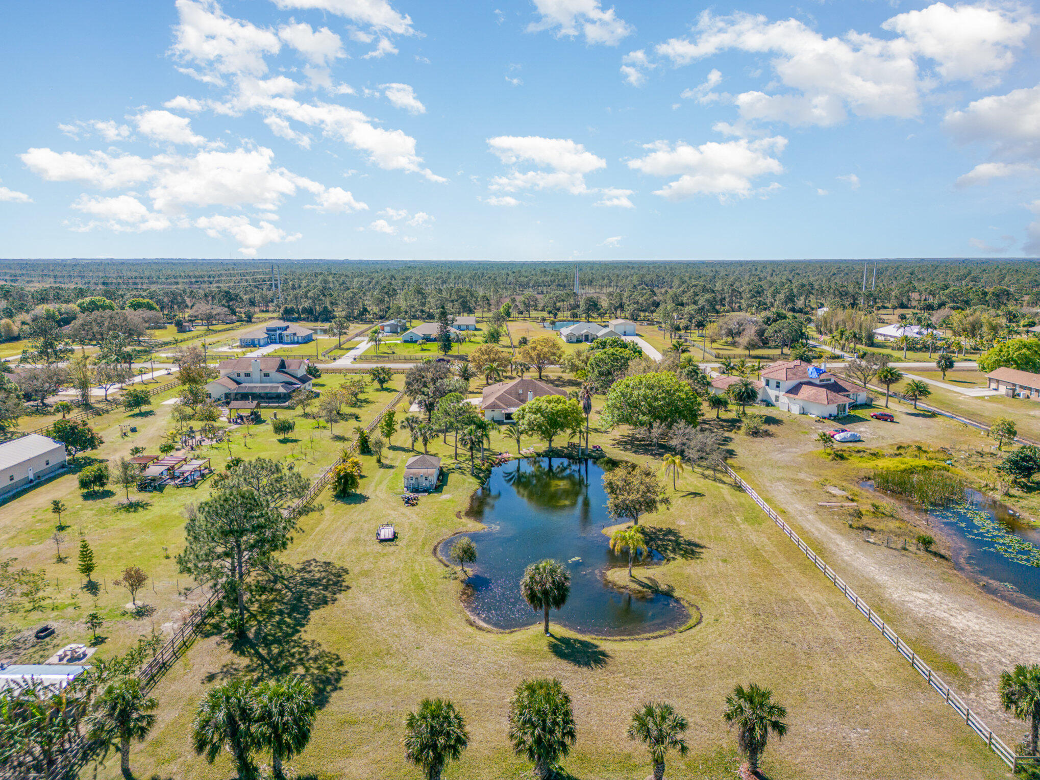 234 Deer Run Road Palm Bay, FL 32909 - Photo 39 of 50 an aerial view of residential houses with outdoor space