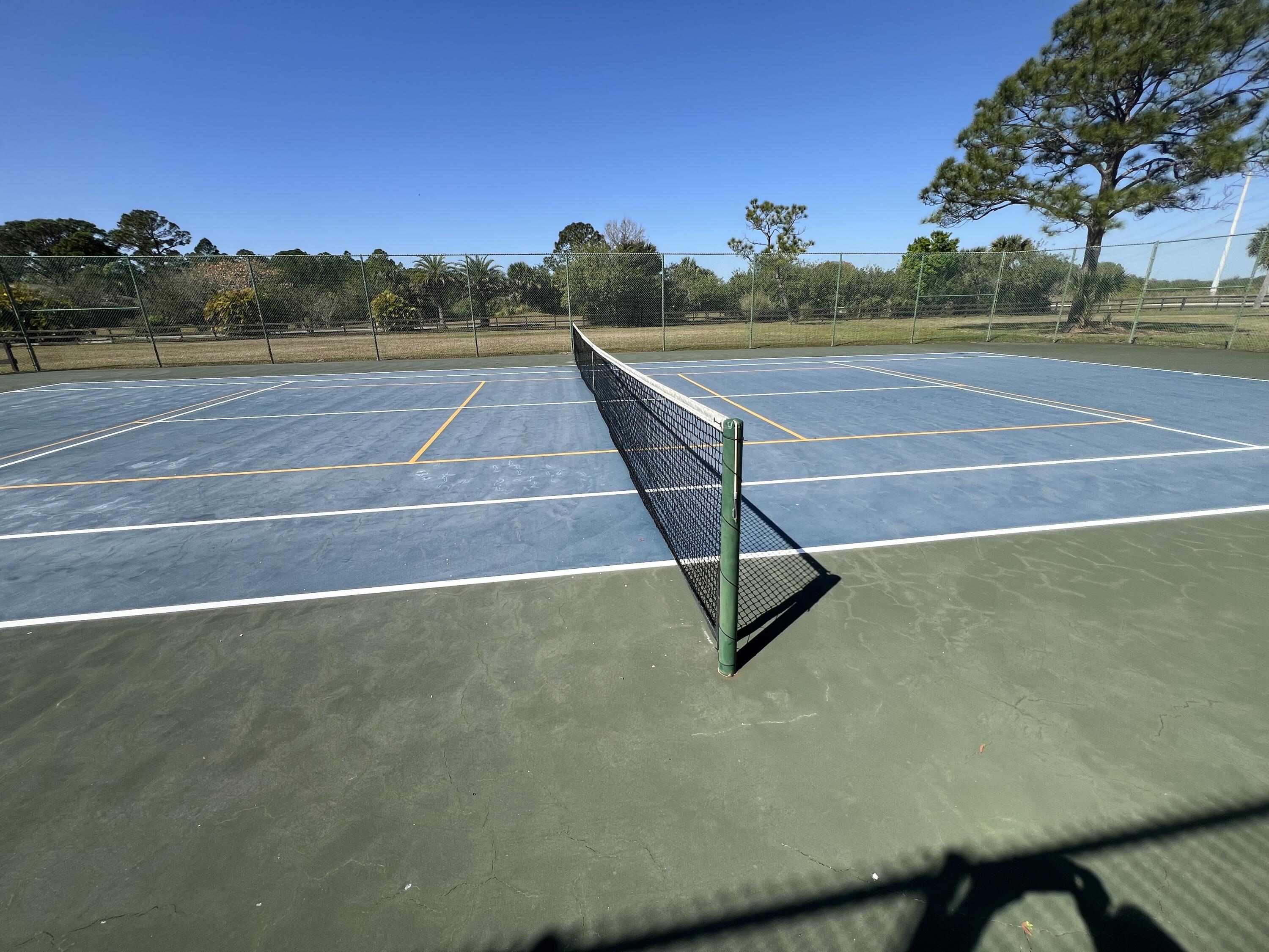 234 Deer Run Road Palm Bay, FL 32909 - Photo 43 of 50 a view of a tennis court