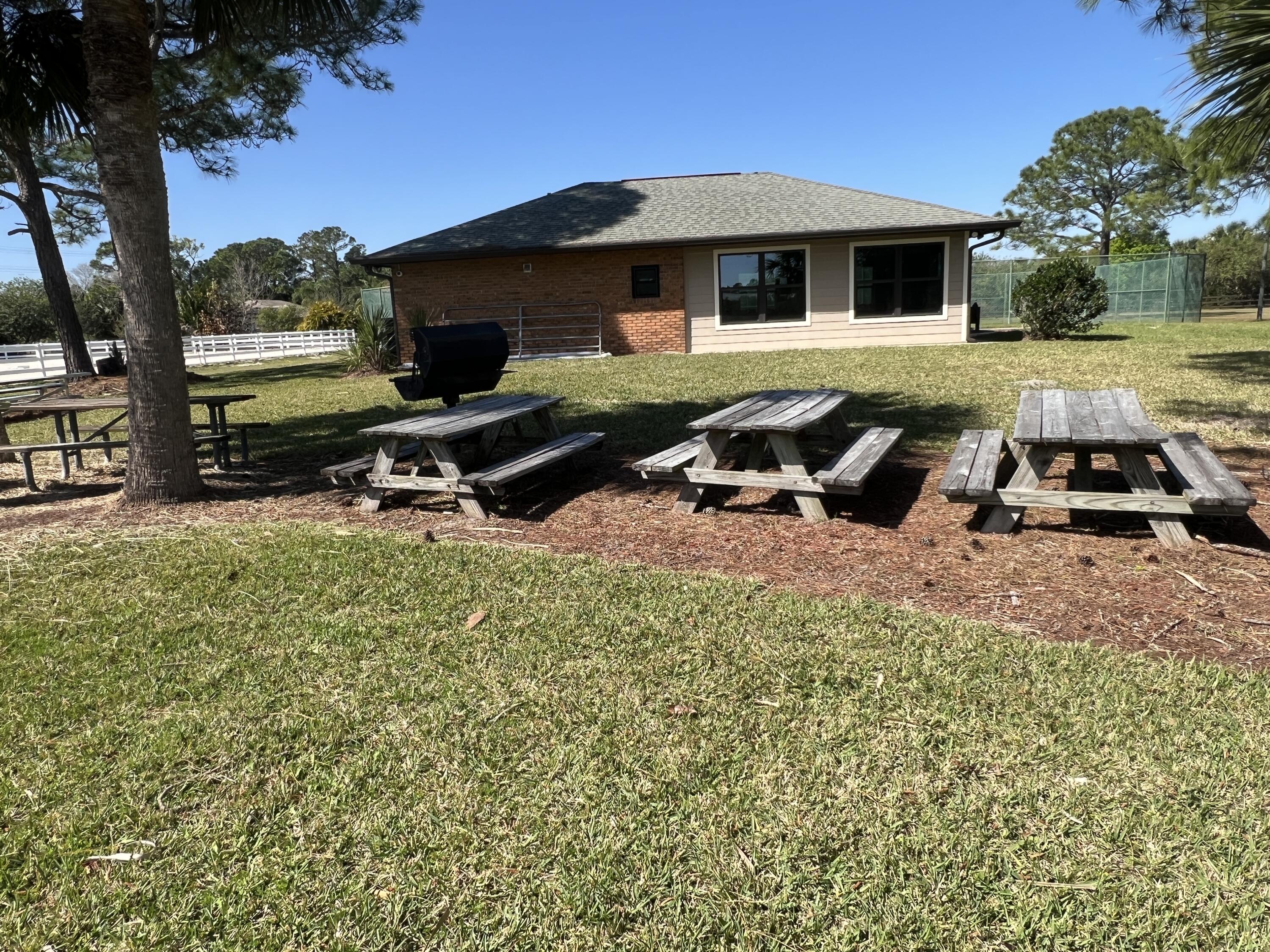 234 Deer Run Road Palm Bay, FL 32909 - Photo 45 of 50 a front view of a house with garden