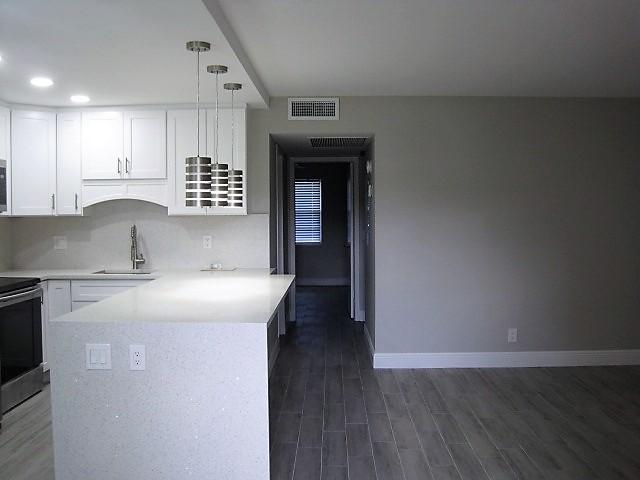 212 Preston F Boca Raton, FL 33434 - Photo 14 of 36 Kitchen/Living Area