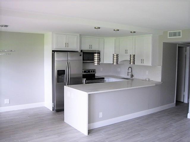 212 Preston F Boca Raton, FL 33434 - Photo 3 of 36 Kitchen/Dining Area