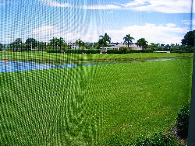 212 Preston F Boca Raton, FL 33434 - Photo 34 of 36 Rear Lake View