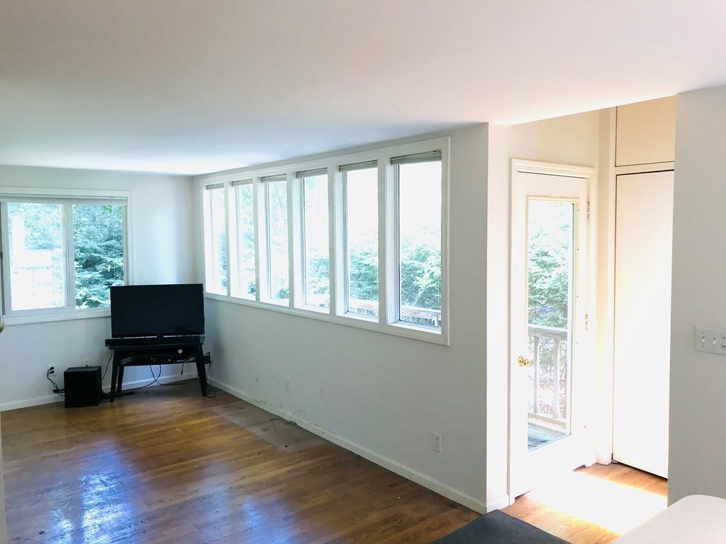 35 Sycamore Road Wayland, MA 01778 - Photo 17 of 42 a view of room with window hardwood floor and workspace