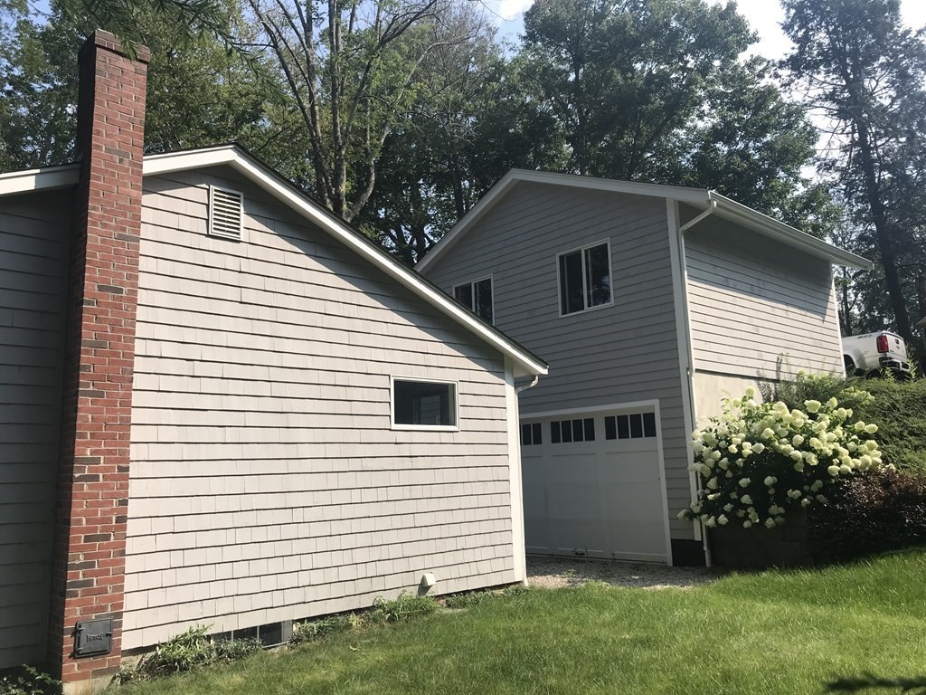35 Sycamore Road Wayland, MA 01778 - Photo 6 of 42 a view of a house with a yard
