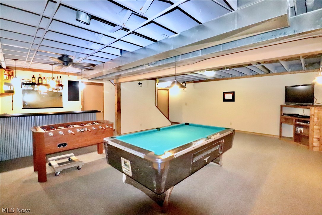 8181 Chatham Road Medina, OH 44256 - Photo 10 of 16 Partially finished basement with a wet bar.