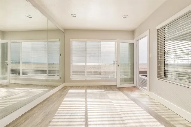 a bedroom with bed and window