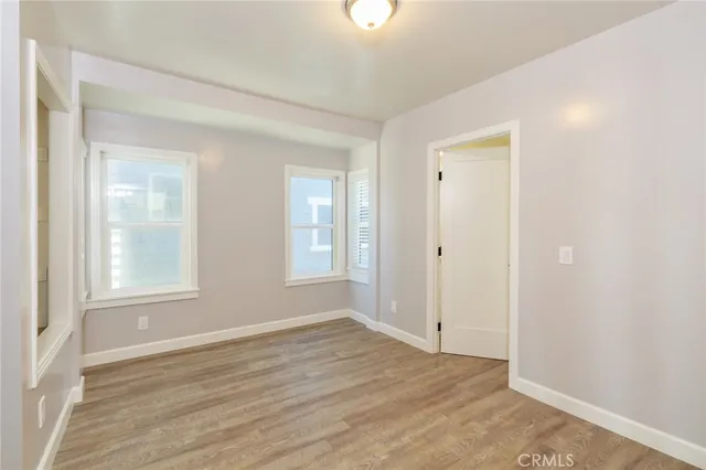 a bathroom with a granite countertop sink a shower and a mirror
