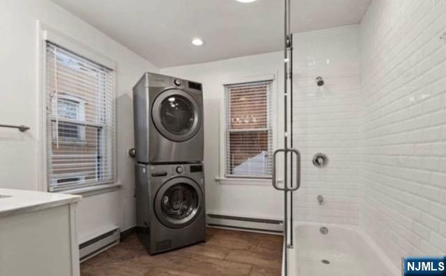 454 Undercliff Avenue Edgewater, NJ 07020 - Photo 18 of 18 a utility room with dryer and washer