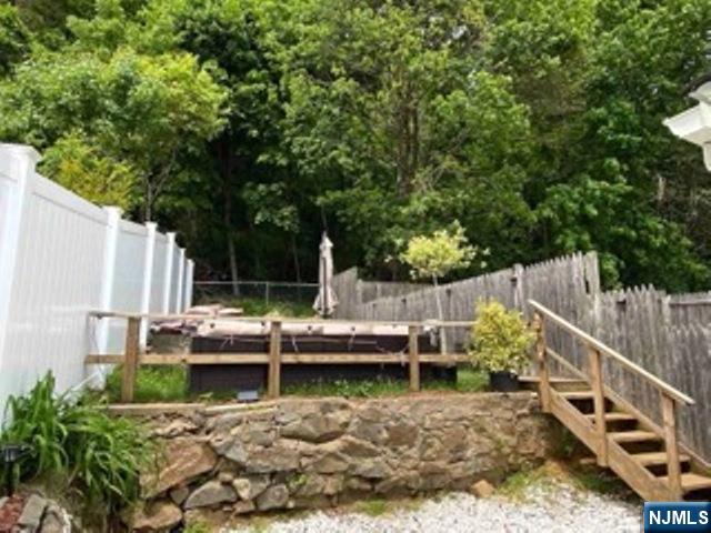454 Undercliff Avenue Edgewater, NJ 07020 - Photo 8 of 18 a view of house with swimming pool and sitting area