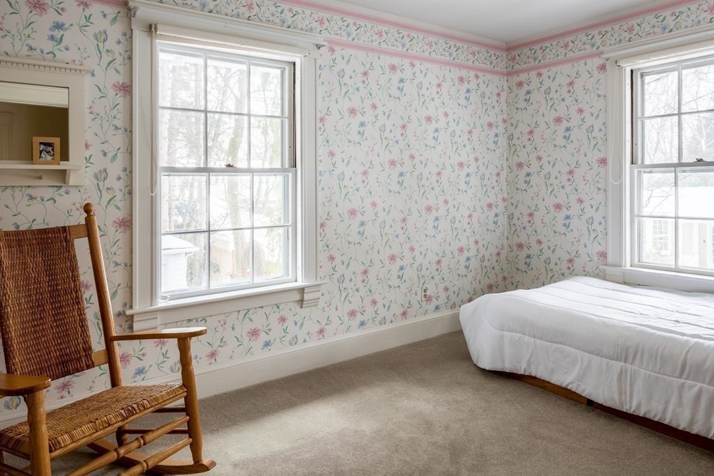 46 Pine Ridge Road Newton, MA 02468 - Photo 12 of 18 a spacious bedroom with a bed and a window