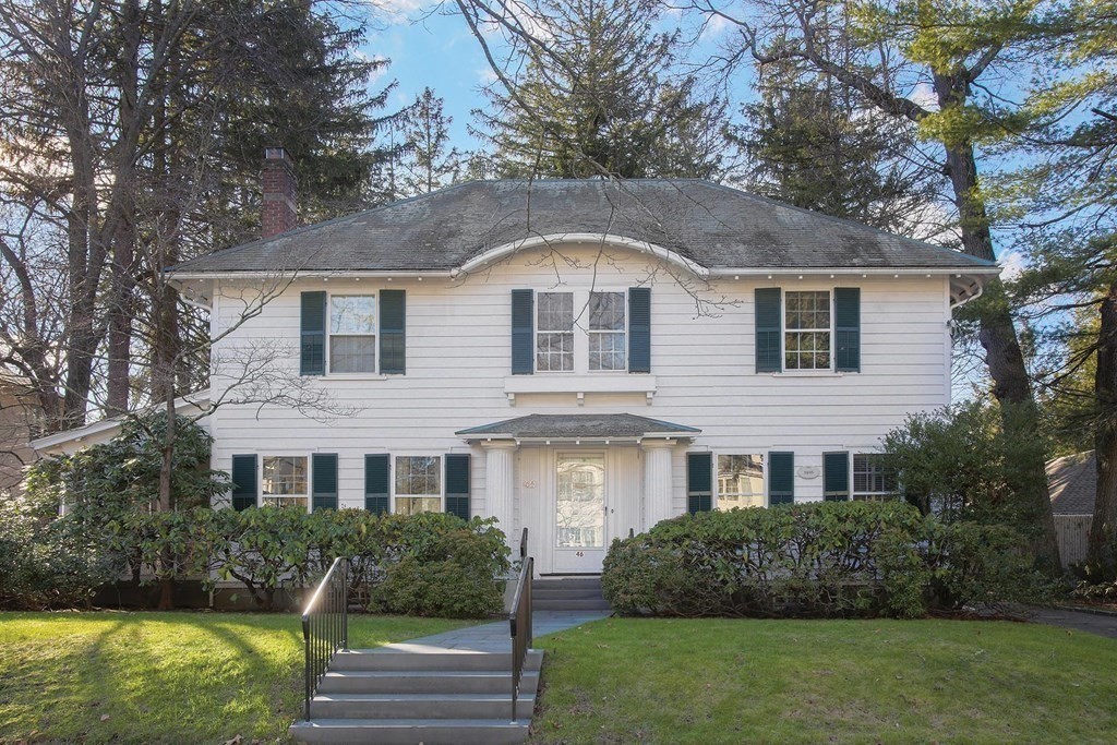 46 Pine Ridge Road Newton, MA 02468 - Photo 16 of 18 a front view of a house with a yard