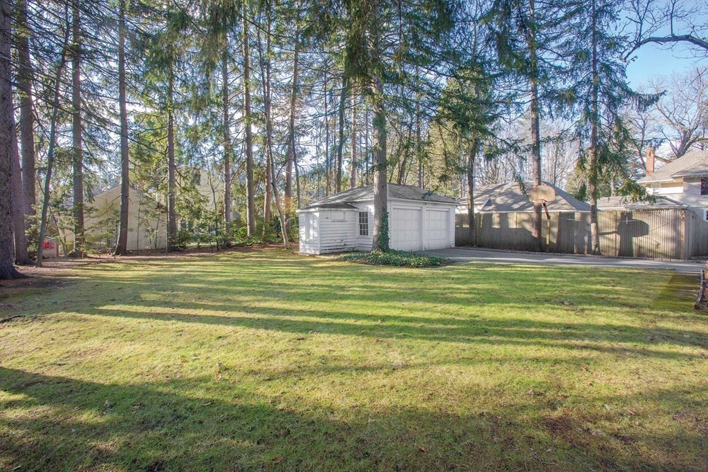46 Pine Ridge Road Newton, MA 02468 - Photo 18 of 18 a view of a house with a big yard and large trees
